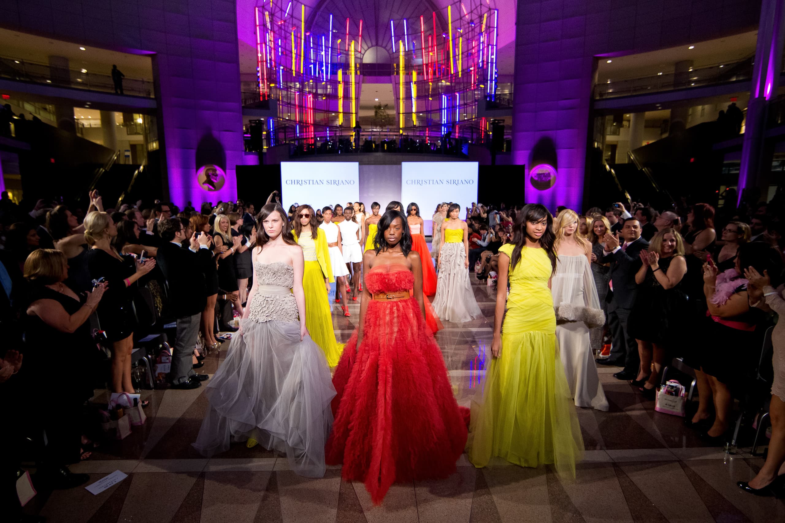 Stage lighting and a live audience, photographed by DC Events Inc.